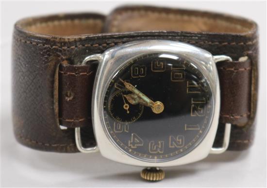 A WWI silver manual wind Officers black dial wrist watch.